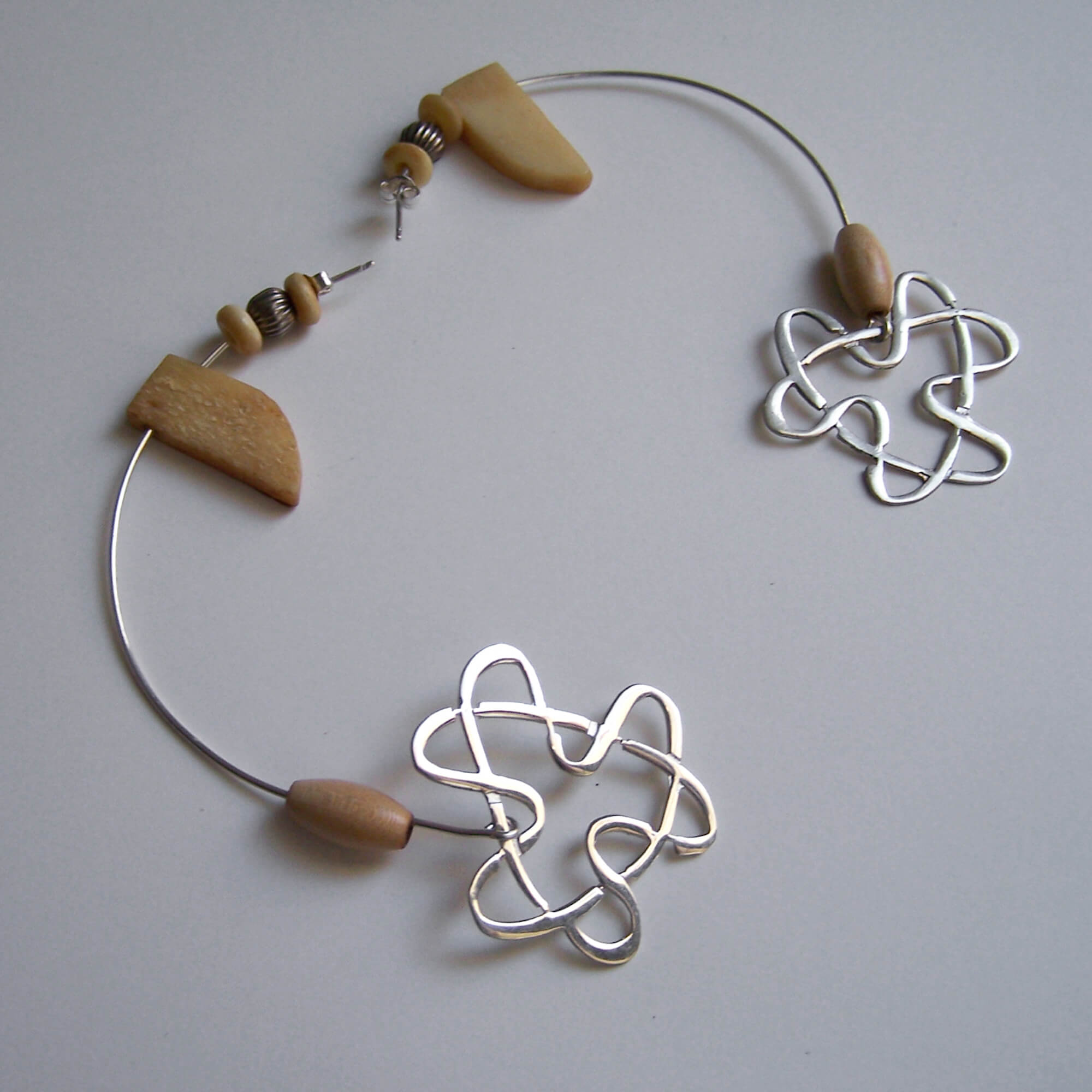 Emilia Tsekoura Heart Rock Collection Marneri Gallery Silver Earrings With Eternal Recurrence Symbol And Bone And Silver Beads 2009 6cm X 9,5cm